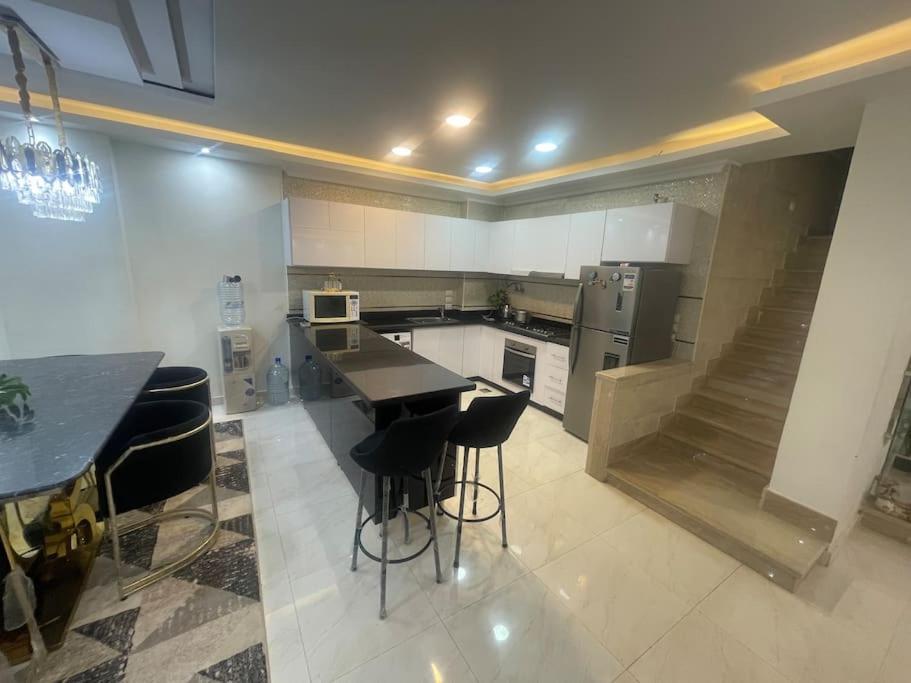 Appartamento Duplex At Golden Square Il Cairo
